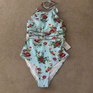 Medium one piece halter style swimsuit NWT.